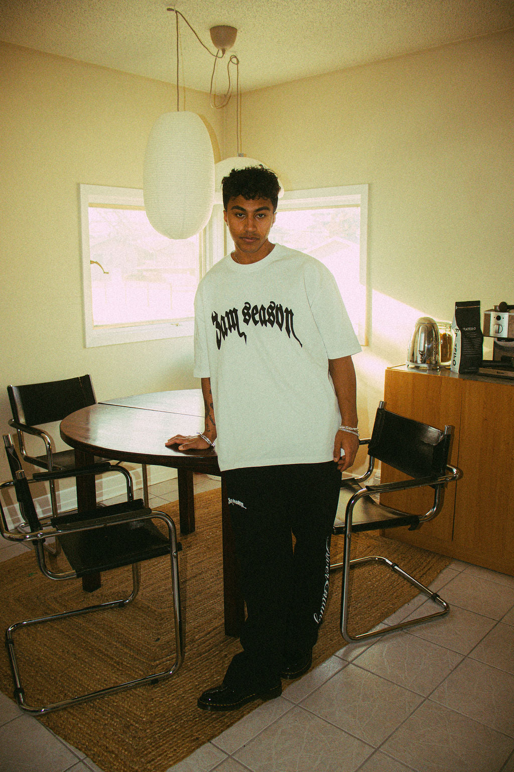 ale model wearing OG t-shirt styled in streetwear look