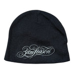 Black beanie with white text on a white background
