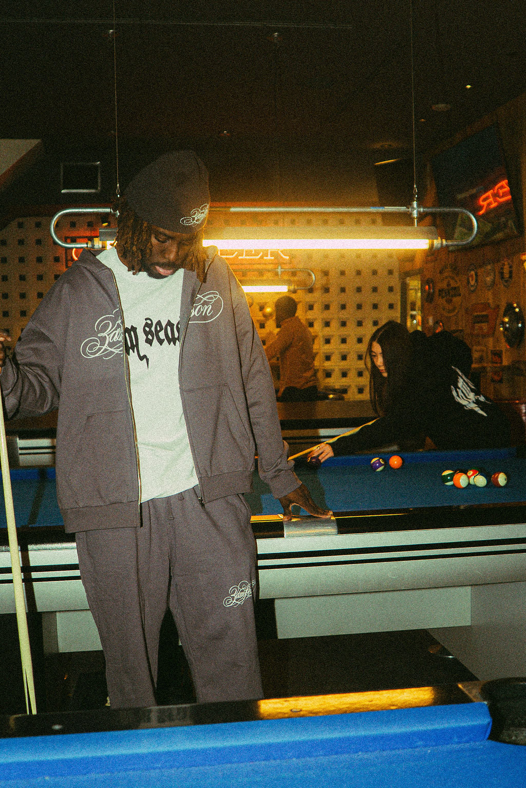 Drop 1 streetwear collection worn by models, complete outfit styling