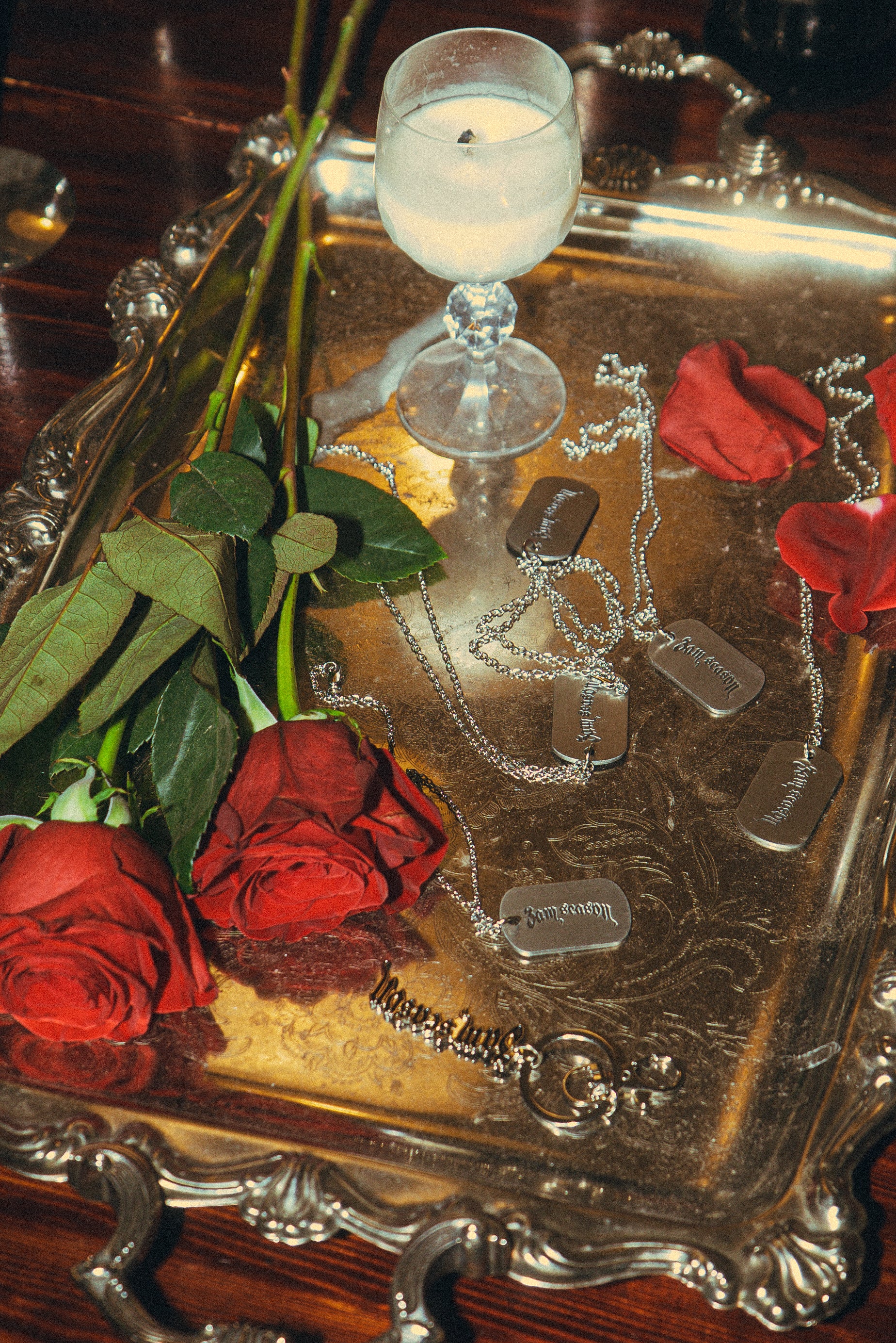 Decorative silver tray with red roses, a candle, and dog tags
CHAOS Stainless Steel Dog Tag