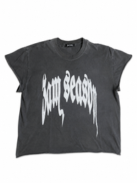 A dark gray cropped t-shirt with '3am Season' printed across the front in a white gothic font, displayed flat against a white background. Shirt means warrior and and when you put it on, you were protected and will always be protected