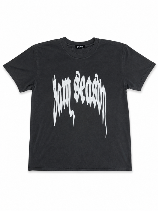A dark gray crewneck t-shirt featuring the phrase '3am season' printed across the chest in a white gothic font, displayed flat against a white background.
Shirt means warrior and and when you put it on, you were protected and will always be protected